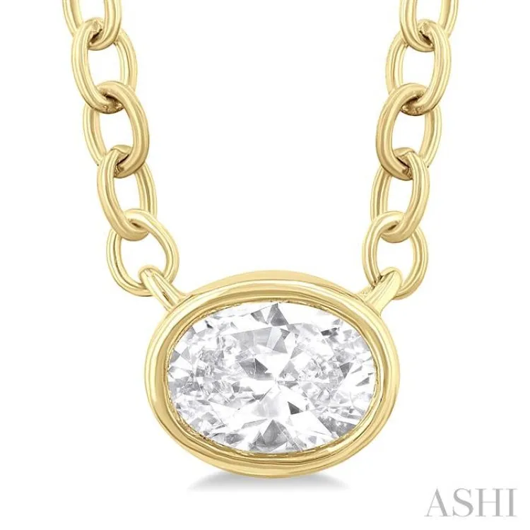 1/6 Ctw Petite East-West Bezel Set Oval Cut Diamond Fashion Pendant With Chain in 10K Yellow Gold