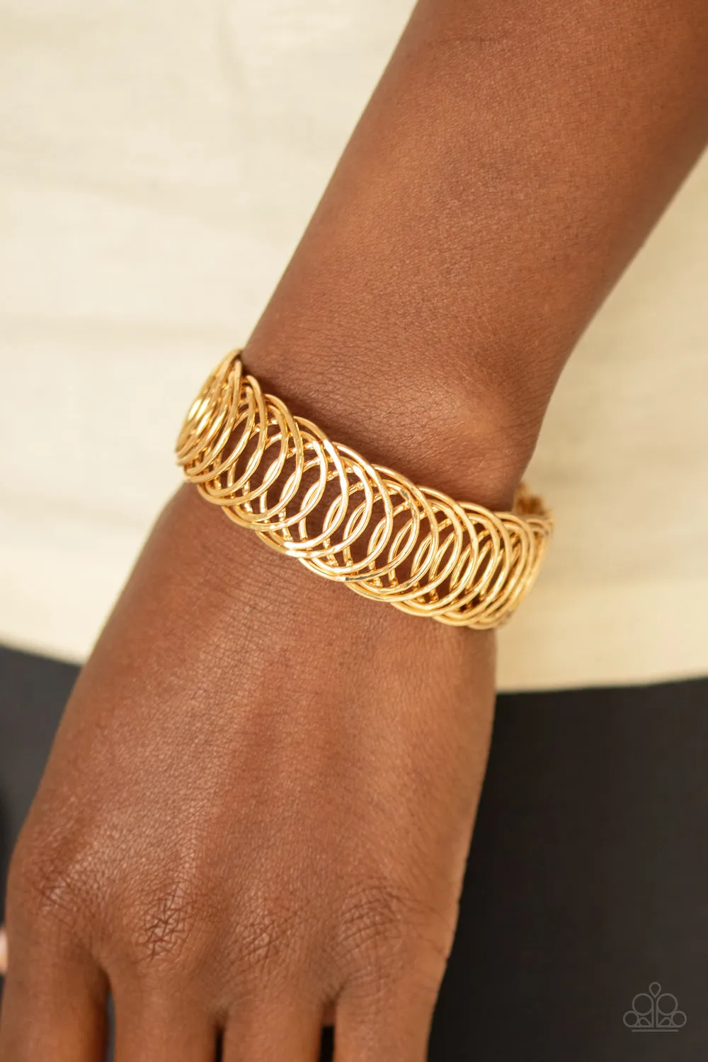 Open Door Jewelry - Dizzyingly Demure - Gold Bracelet - Paparazzi Accessories