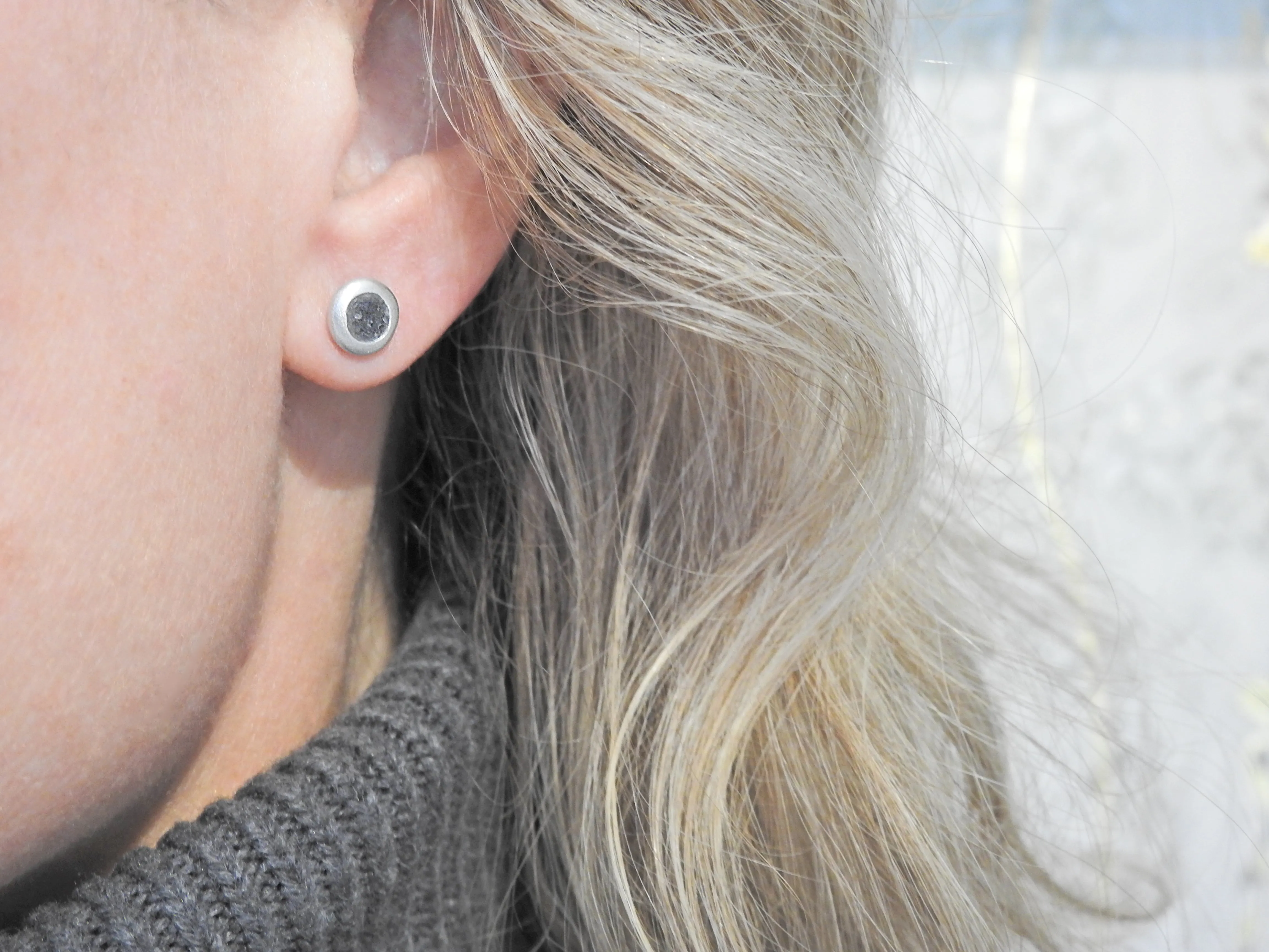 Pebble studs with limestone inlay