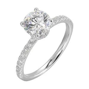 Shine from every angle with this gorgeous round solitare hidden halo engagement ring. This timeless design offers elegance making it everlasting symbol of your love.